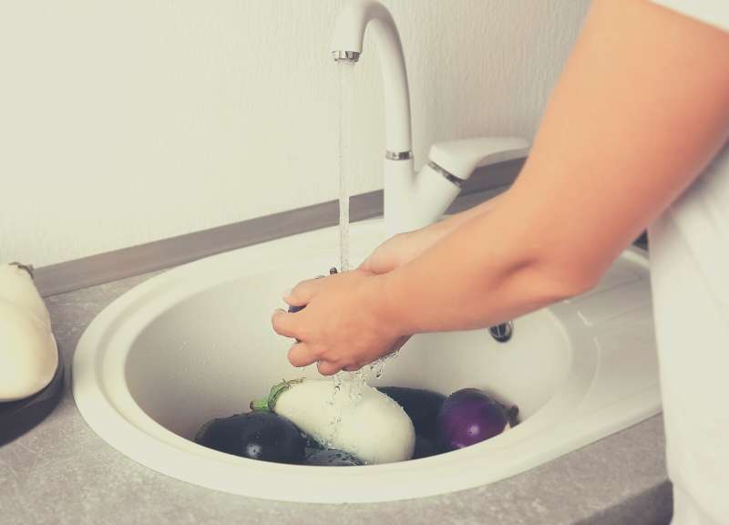 cleaning eggplants