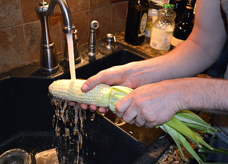 washing Corn On The Cob
